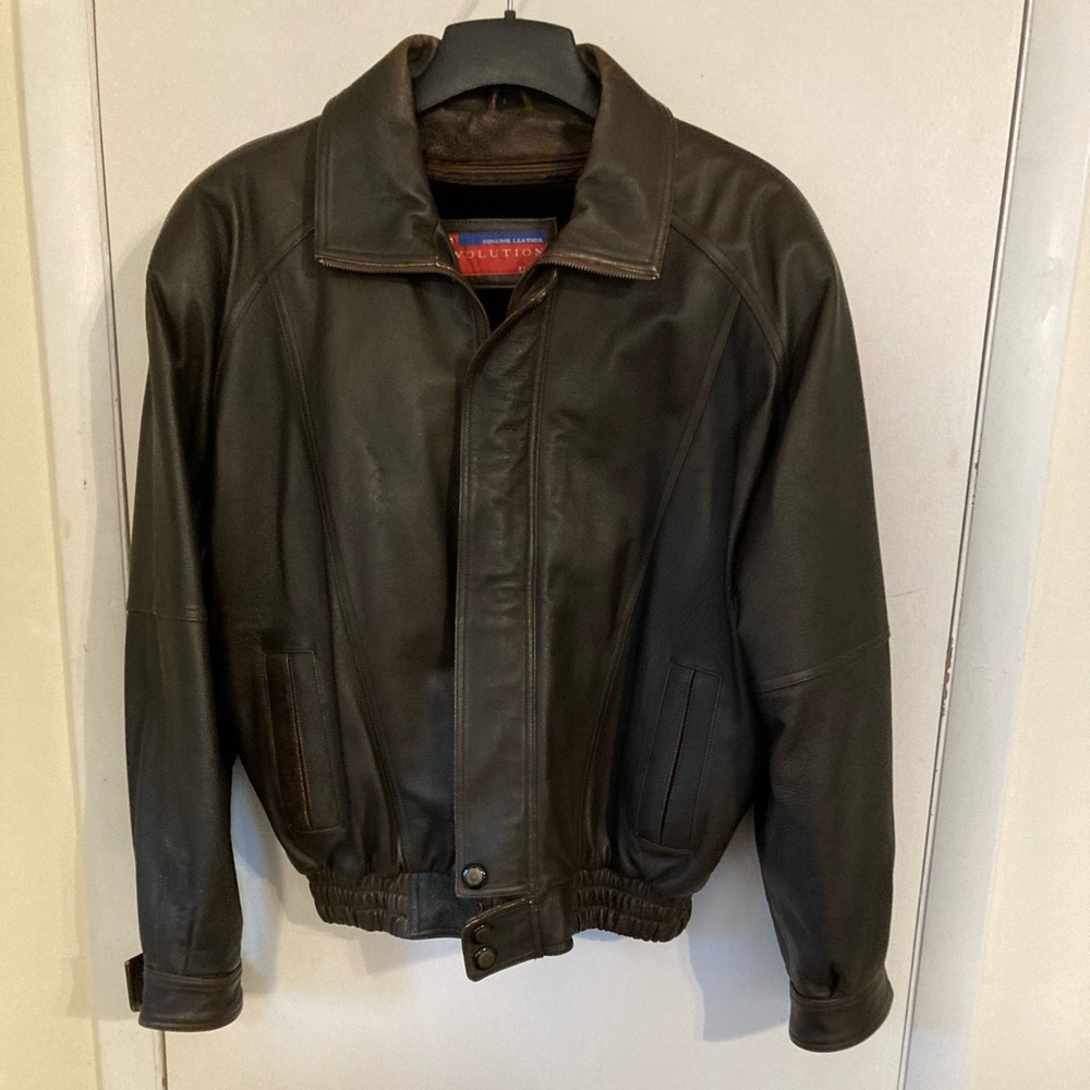 Mens leather jacket made in USA in EXCELLENT condition very heavy. Barely used